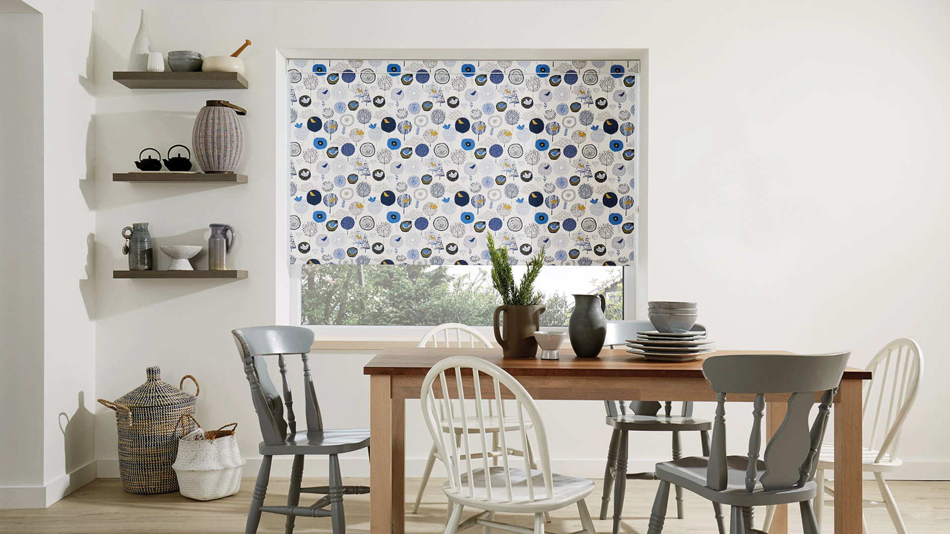 Roller blinds fitted inside a bright modern room