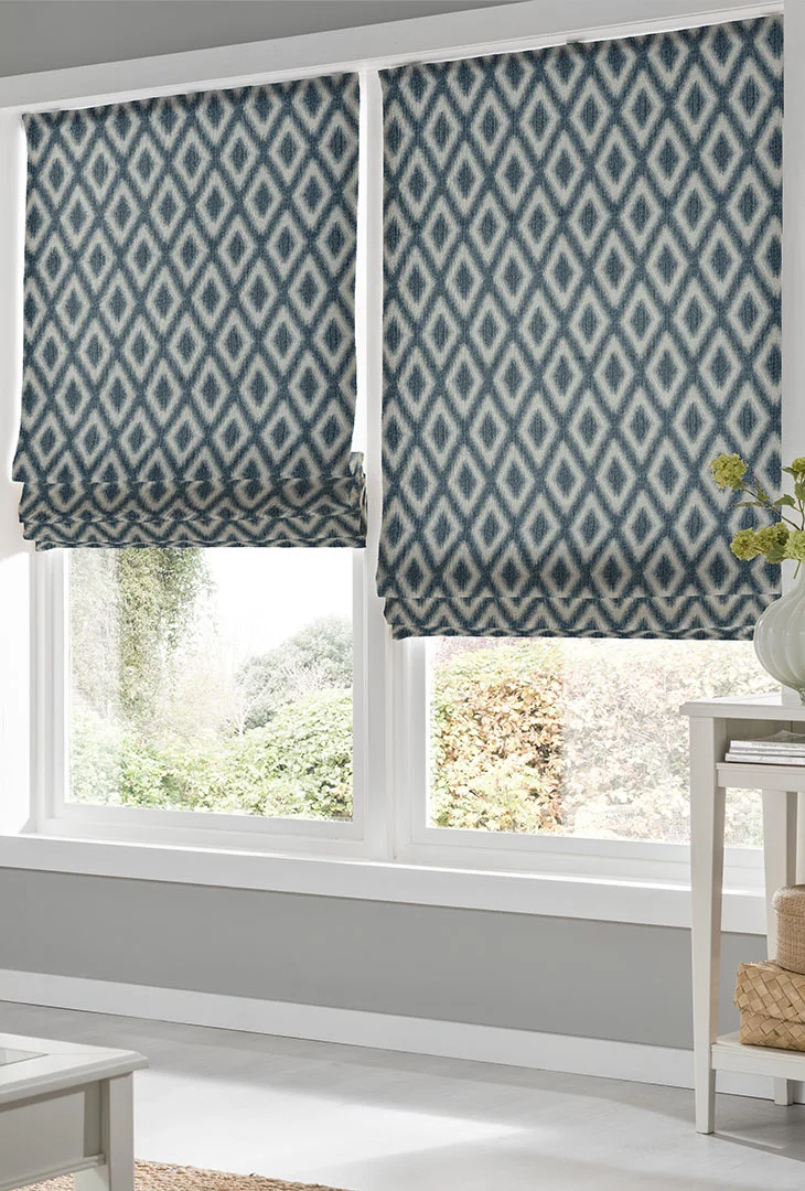 Roman blinds styled in a warm interior